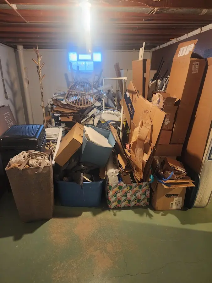 Roll-off dumpster container at job site for 8 Yard Dumpster Rental in Lantana